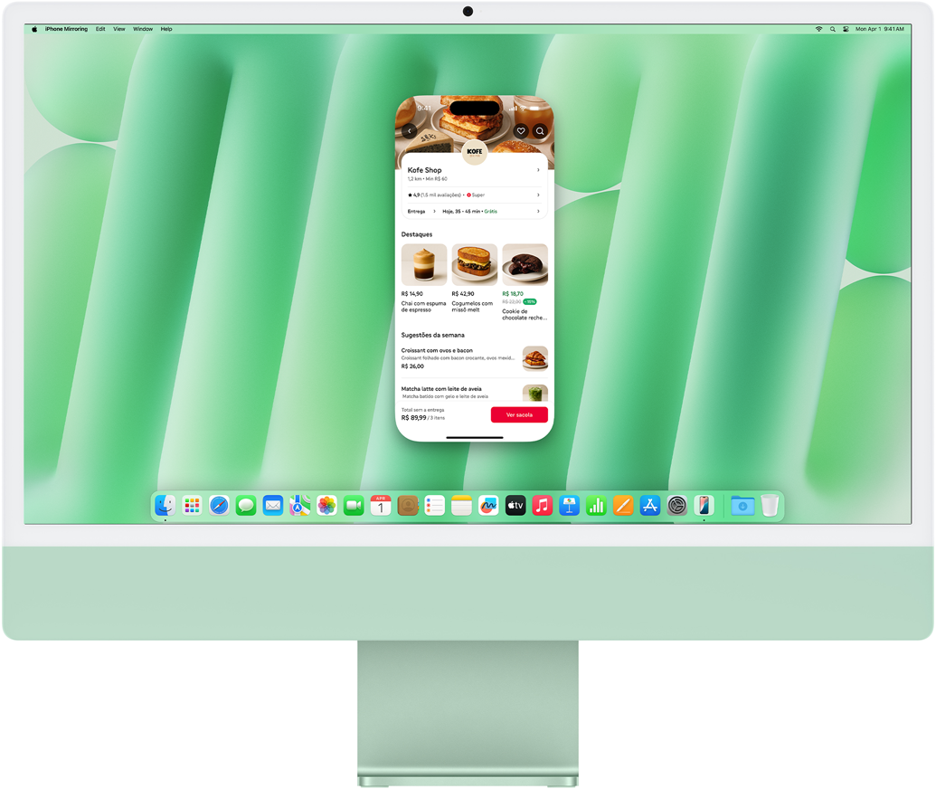 Demonstração do recurso Espelhamento do iPhone. Tela do iPhone mostrando o app Uber Eats duplicada e controlada no iMac.