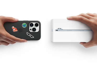 Side-by-side, hand holding iPhone 13 in silicon case with stickers on back exterior, trade-in with hand holding new iPhone box for iPhone 17