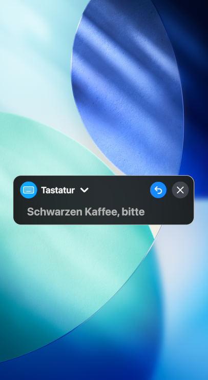 Feature „Live Sprachausgabe“, das den Text „Schwarzen Kaffee, bitte“ laut ausspricht.