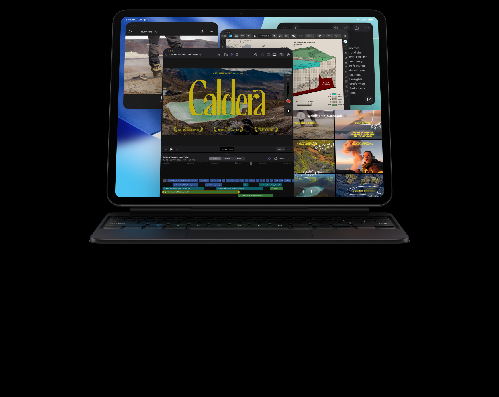 iPad Pro i space black vist forfra i vandret position, fastgjort til Magic Keyboard i space black, skærmen viser flere appvinduer: Final Cut Pro med forskellige funktioner til videoredigering og en tidslinje, Kort, Noter og medieklip