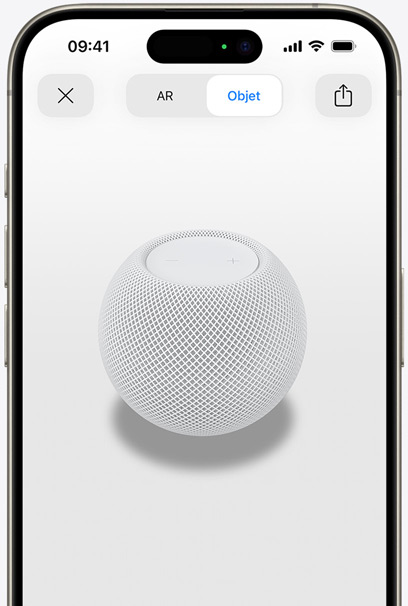 HomePod blanc en réalité augmentée sur l’écran d’un iPhone.