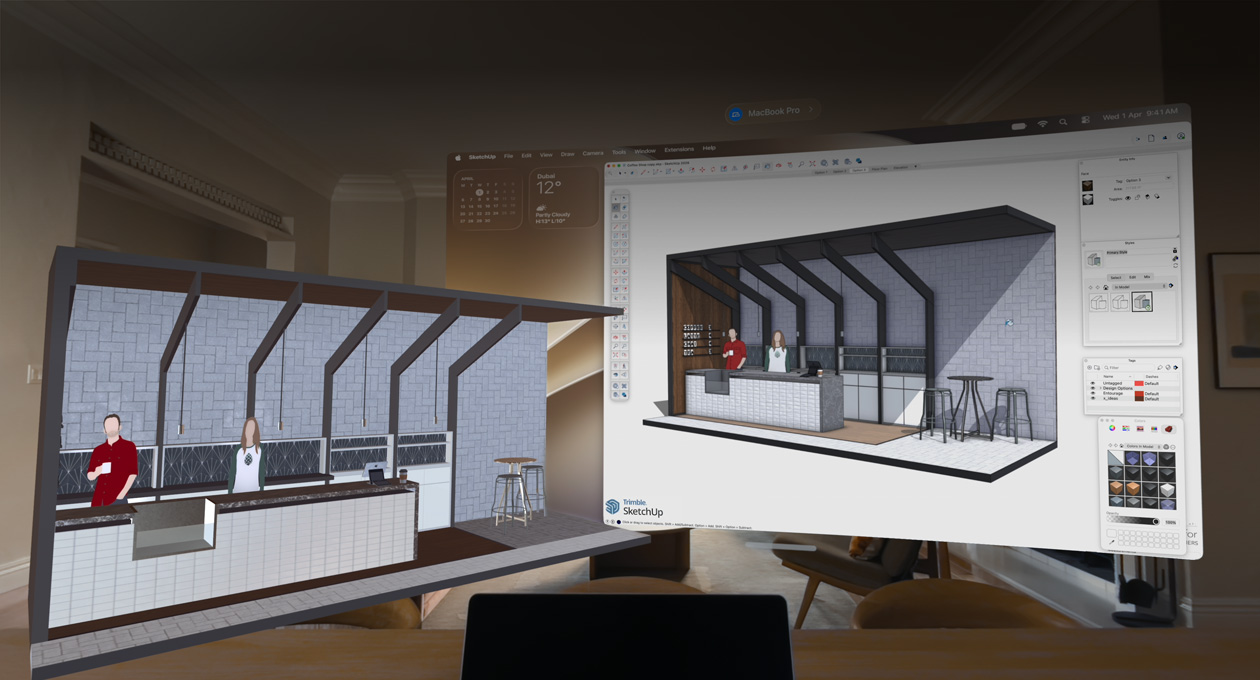 Apple Vision Pro view, MacBook Pro sits on a surface with 3D models projected behind it, models show a cafe service counter with two people standing behind it