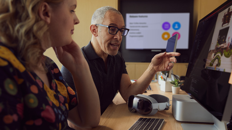 Developers exploring the new developer tools for Apple Vision Pro. 