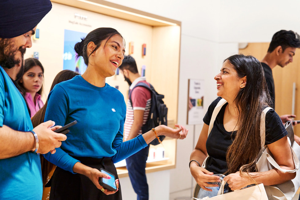 An Apple Specialist at an Apple Store in Delhi.
