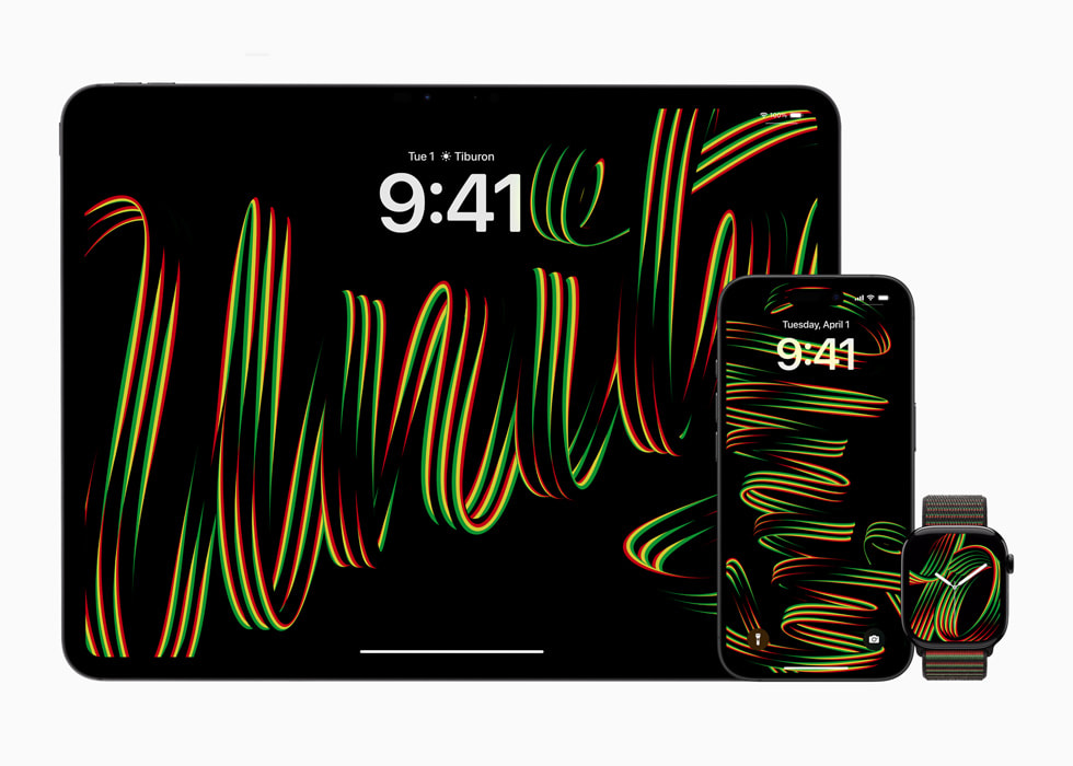 The new Black Unity wallpaper is shown on iPhone and iPad, and Apple Watch is shown with the Black Unity Sport Loop and watch face.