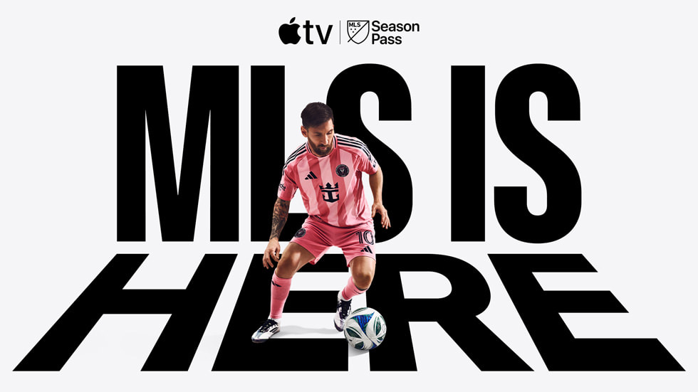 Inter Miami FC’s Lionel Messi dribbles a soccer ball against a backdrop that reads MLS IS HERE.