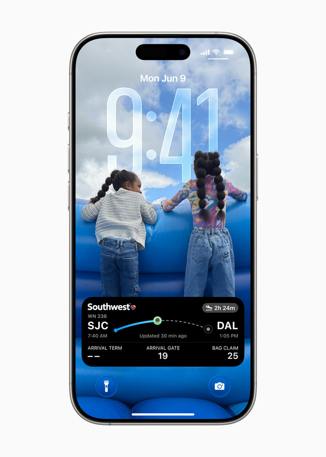 On iPhone 16 Pro, a Live Activity shows a friend’s live flight status.
