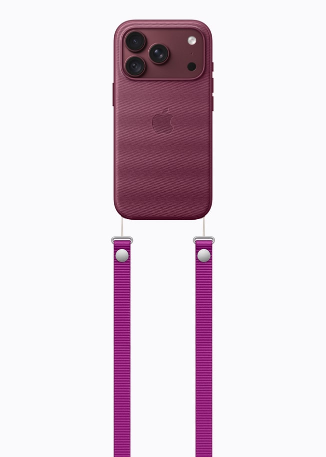 Un iPhone 18 Pro color borgoña con una funda que hace juego y una correa cruzada magenta.