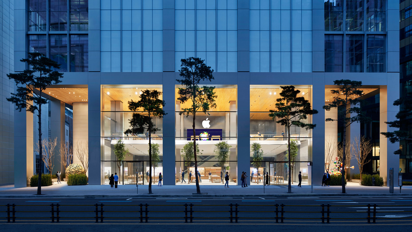 The storefront of Apple Myeongdong is shown in the heart of Seoul’s busy shopping district.