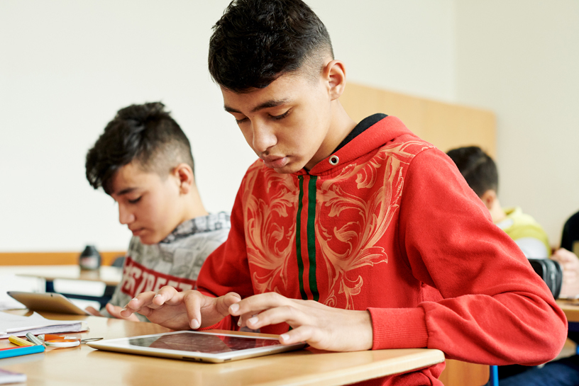 Students at Wilhelm Ferdinand Schussler Day School use iPad as a tool.