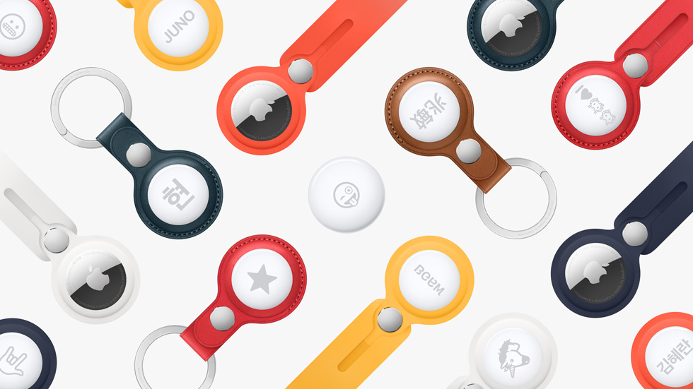 Array of AirTag accessories, personalized with various emoji and text.