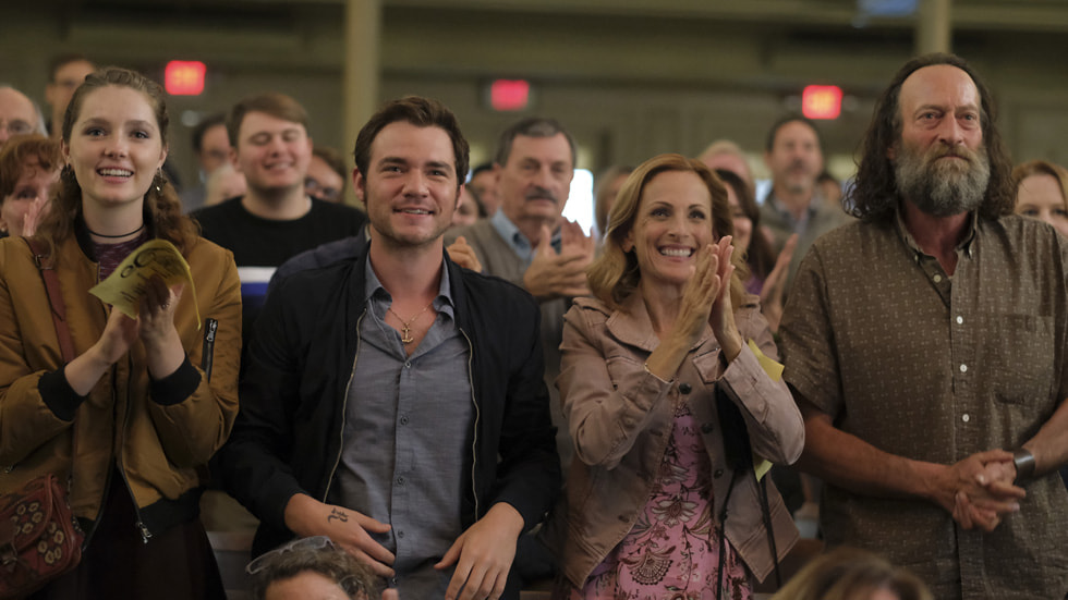 A still from the Apple Original Film “CODA” shows cast members Emilia Jones, Daniel Durant, Marlee Matlin, and Troy Kotsur.
