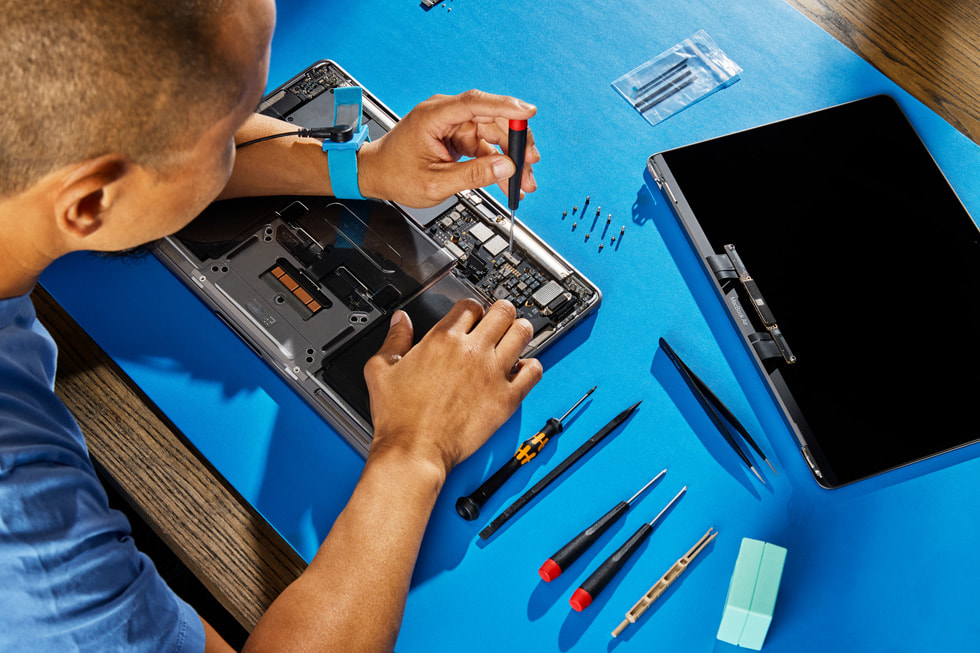 A Self Service Repair being performed on a MacBook Air.