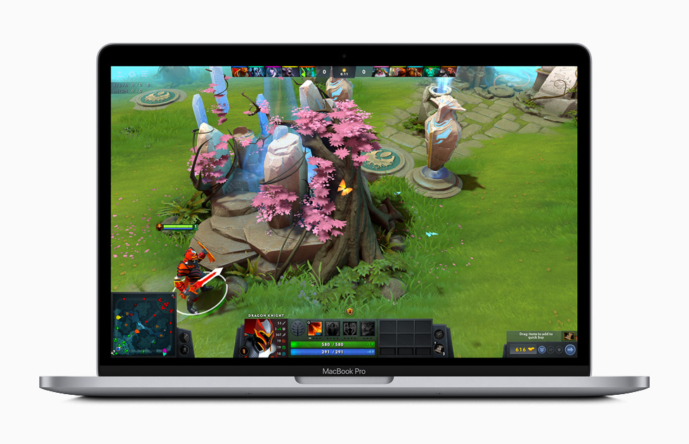 Dota 2 gameplay displayed on MacBook Pro.