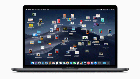 Stacks cleaning up files on a MacBook Pro desktop into stacks.