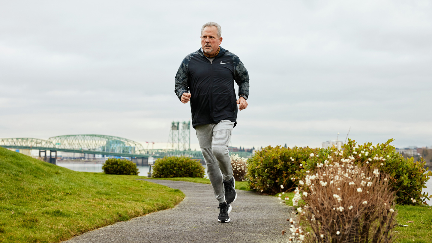 Bob March running outdoors.
