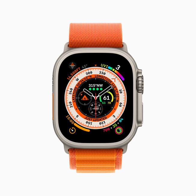 Die Apple Watch Ultra mit dem Alpine Loop in Orange, die das Wayfinder Zifferblatt zeigt.