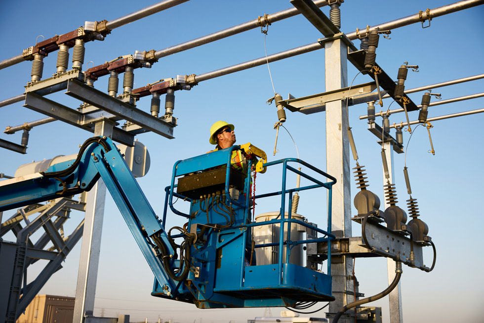A crew member checking equipment for the IP Radian Solar project in Brown County, Texas.