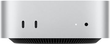 Mac mini spredu, dva porty Thunderbolt, stavová kontrolka a konektor na slúchadlá, zúžená čierna základňa naspodku, plochá vrchná strana, zaoblené bočné strany, rovné hrany, strieborná farba