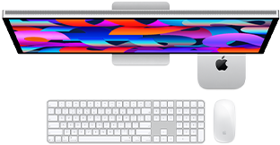 Mac mini під StudioDisplay, клавіатура Magic Keyboard із цифровою панеллю, миша Magic Mouse