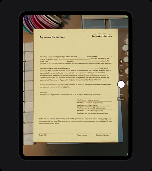 iPad Pro, front exterior, portrait orientation, space black colour, display showing a scanned document titled "Agreement for Services" with text and signature lines clearly visible