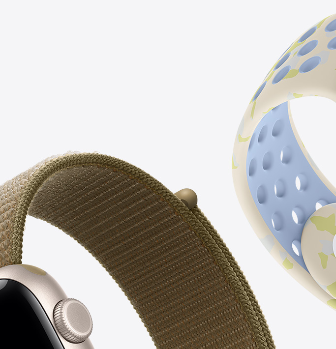 ساعة Apple Watch SE 3، إطار ألومنيوم، لون ضوء النجوم، حزام Loop رياضي، لون زيتي (أخضر ترابي)، حزام رياضي Nike، لون أبيض كلسي هادئ، (لون كريمي من الجهة الخارجية، لون أزرق فاتح من الجهة الملامسة للبشرة، نمط خفيف لأشكال باللون الأخضر المصفر)