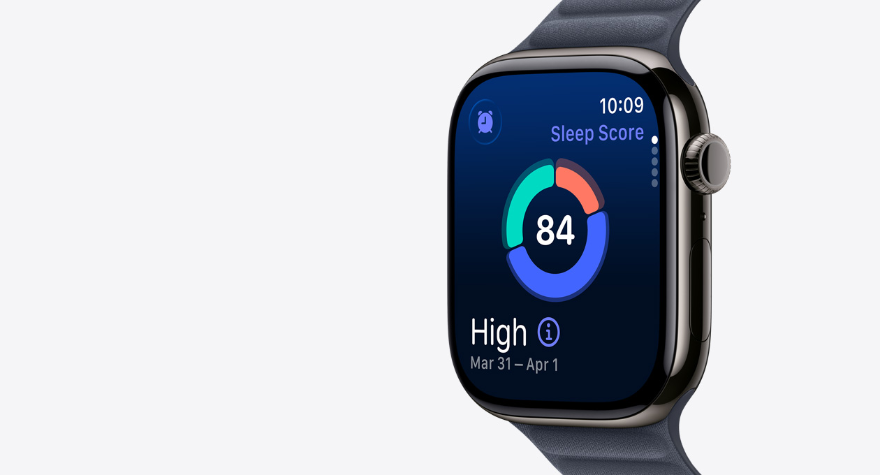 Apple Watch Series 11, slate color, titanium case, screen shows sleep score circle graph, right side exterior, Digital Crown, band, navy Magnetic Link