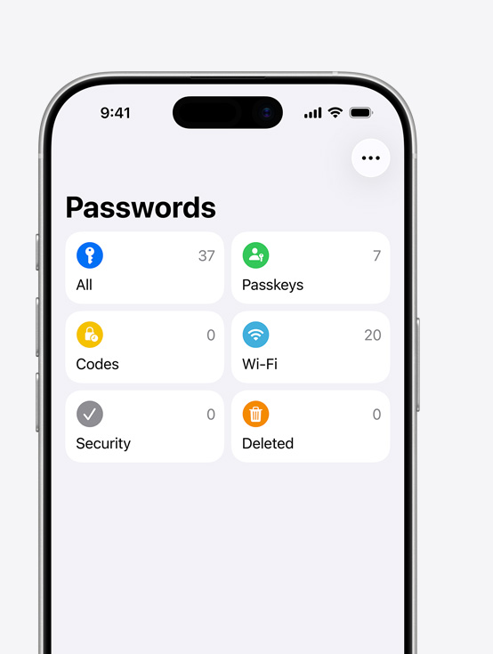 Écran d’iPhone affichant le menu de l’app Mots de passe avec les options Tout, Clés d’accès, Codes, Wi‑Fi, Sécurité, Supprimés